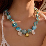 Load image into Gallery viewer, Stardust Catch: Telescopic Shell Pendant

