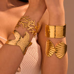 Load image into Gallery viewer, Eternal Spiral: Carved Conch Gold Bangle
