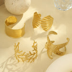 Load image into Gallery viewer, Eternal Spiral: Carved Conch Gold Bangle
