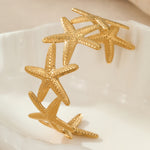 Load image into Gallery viewer, Twin Tides Interlocked Shell Bangle
