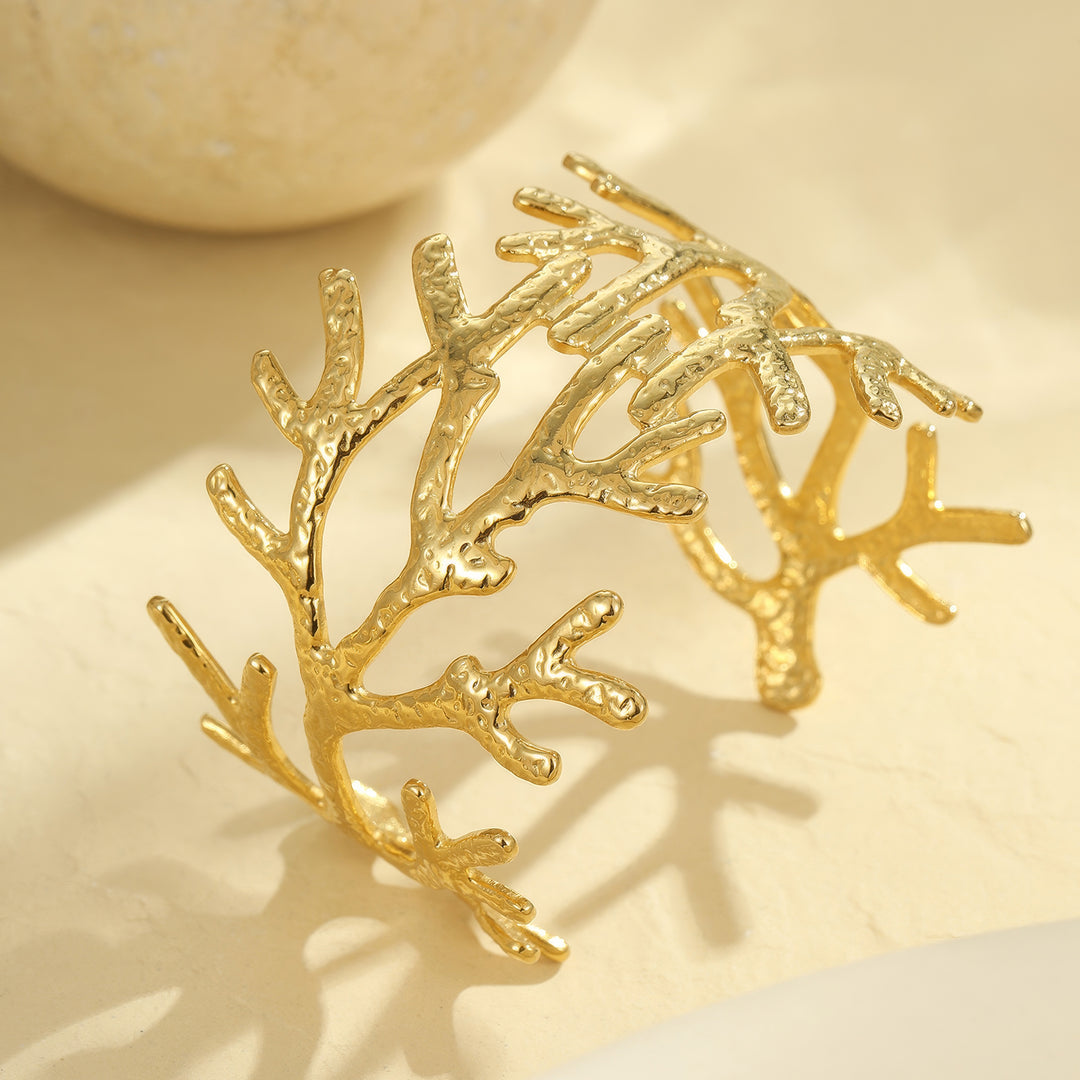 Eternal Spiral: Carved Conch Gold Bangle