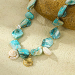 Load image into Gallery viewer, Stardust Catch: Telescopic Shell Pendant
