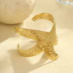 Load image into Gallery viewer, Eternal Spiral: Carved Conch Gold Bangle
