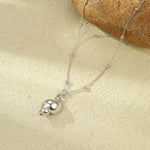 Load image into Gallery viewer, Sonic Spiral: Bimetallic Conch Necklace
